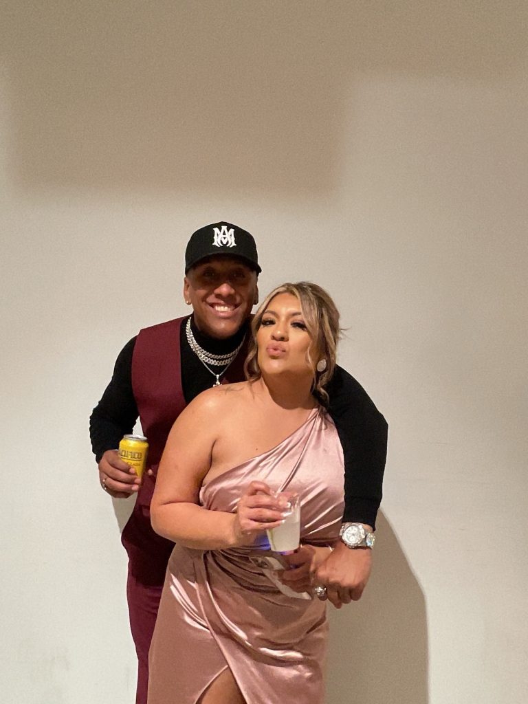 Couple posing together during a celebration