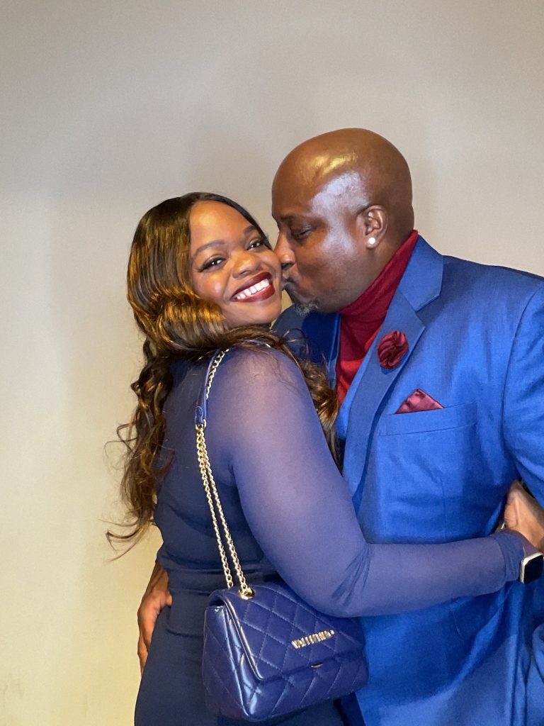 Couple sharing a joyful moment at an event