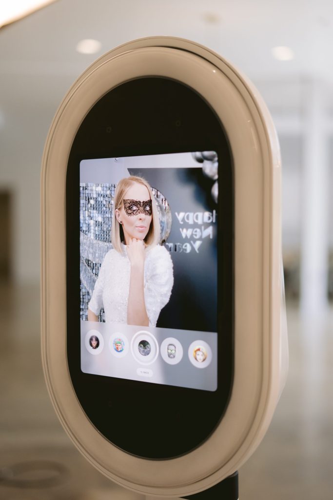 Photo booth screen displaying a themed photo filter